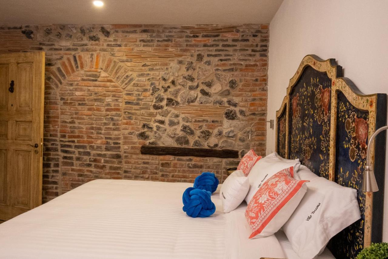 Villa Toscana Valquirico Lofts & Suites Hotel Boutique Santeagueda Exteriör bild
